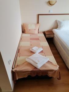 Postel nebo postele na pokoji v ubytování Family Hotel Dayana Beach