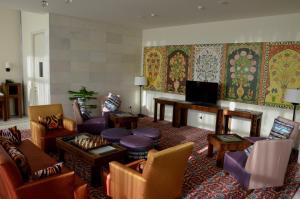 A television and/or entertainment centre at Dushanbe Serena Hotel