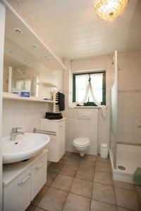 Ein Badezimmer in der Unterkunft Ferienhaus Seeblick am Jabeler See mit Sauna