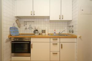 Ett kök eller pentry på Haus-am-Meer-App-71
