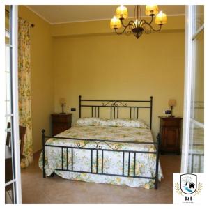 Postel nebo postele na pokoji v ubytování B&b Sant'Andrea