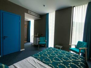Letto o letti in una camera di Pano Hotel