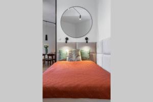 Posteľ alebo postele v izbe v ubytovaní Apartament JK Toruń