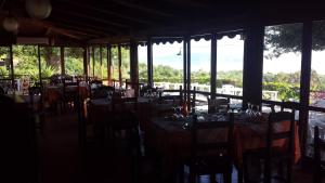 Ein Restaurant oder anderes Speiselokal in der Unterkunft Agriturismo Valle di Marco 