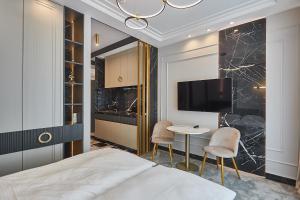 Posteľ alebo postele v izbe v ubytovaní Apartamenty Świnoujście - Lividus 323