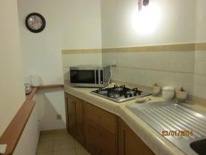 Küche/Küchenzeile in der Unterkunft Attico Con Vista Panoramica Sul Mare