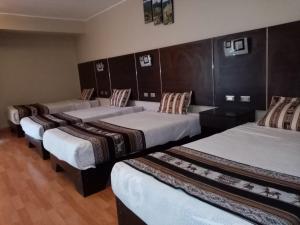 Hotel Mantas Cusco客房内的一张或多张床位