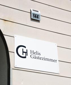 Certificato, attestato, insegna o altro documento esposto da Helis Gästezimmer