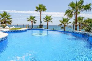 Bazén v ubytovaní LUXURY APARTMENT Benalmadena Costa alebo v jeho blízkosti