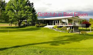 a view of a golf club in baden at Unterkunft Ramser in Bad Eilsen