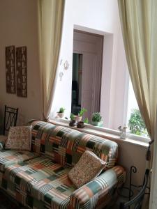 A bed or beds in a room at Il Giardino Del Purgatorio
