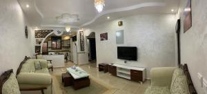 Μια τηλεόραση ή/και κέντρο ψυχαγωγίας στο Amro Petra Apartment