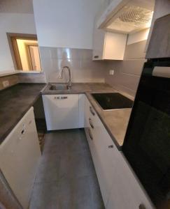Kuchyňa alebo kuchynka v ubytovaní Apartman SPOT