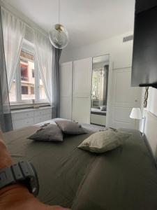Posteľ alebo postele v izbe v ubytovaní Bilocale di prestigio: Milano Centro