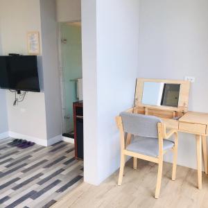TV a/nebo společenská místnost v ubytování One Way B&B