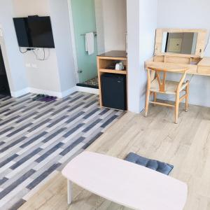 TV a/nebo společenská místnost v ubytování One Way B&B