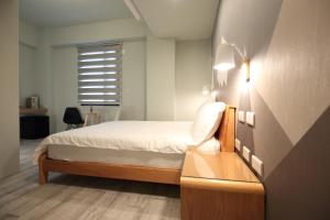 Postel nebo postele na pokoji v ubytování One Way B&B