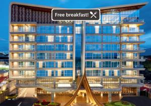 a rendering of a apartment building with a free breakfast sign at Hotel Santika Bukittinggi in Bukittinggi