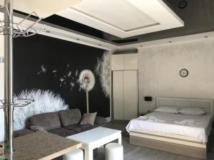 Ένα ή περισσότερα κρεβάτια σε δωμάτιο στο Hotel Chaika