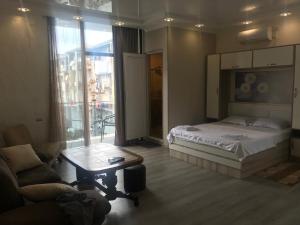 Ένα ή περισσότερα κρεβάτια σε δωμάτιο στο Hotel Chaika