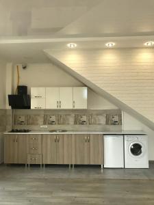 Η κουζίνα ή μικρή κουζίνα στο Hotel Chaika