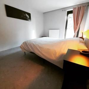 Letto o letti in una camera di Le gîte du Verger