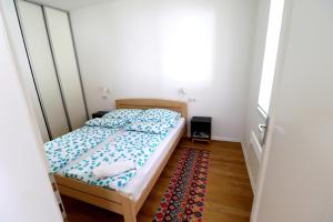 Posteľ alebo postele v izbe v ubytovaní Friends & Family Apartmanok Velence