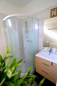 Kúpeľňa v ubytovaní Friends & Family Apartmanok Velence
