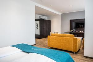 Postel nebo postele na pokoji v ubytování RheinCity Hotel & Boardinghouse