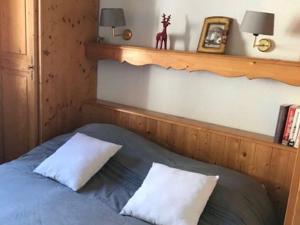 Ліжко або ліжка в номері Appartement Valloire, 2 pièces, 4 personnes - FR-1-263-478