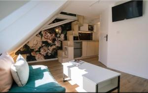 Køkken eller tekøkken på L'ÉVASION - COZY - RBNB