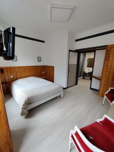 Posteľ alebo postele v izbe v ubytovaní Hôtel Saint - Pierre