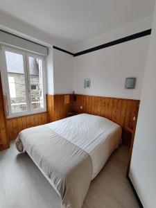 Postel nebo postele na pokoji v ubytování Hôtel Saint - Pierre
