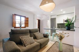 Posedenie v ubytovaní Encarnación Suite Apartment