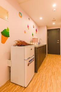 Kuchyň nebo kuchyňský kout v ubytování 閣樂親子旅宿Kids Fun Hotel