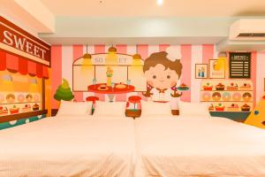 Postel nebo postele na pokoji v ubytování 閣樂親子旅宿Kids Fun Hotel
