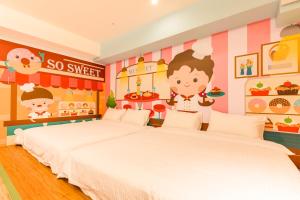 Postel nebo postele na pokoji v ubytování 閣樂親子旅宿Kids Fun Hotel