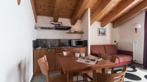 Kuchyň nebo kuchyňský kout v ubytování Residence Pizzo Scalino
