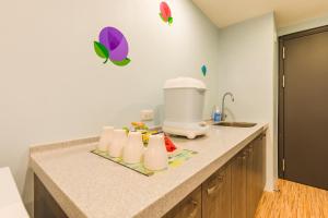 Kuchyň nebo kuchyňský kout v ubytování 閣樂親子旅宿Kids Fun Hotel