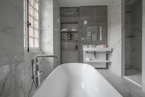 Kupatilo u objektu Au vieux Château