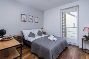 מיטה או מיטות בחדר ב-LUX Residence with Garage Garden 5rooms