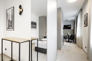 Postel nebo postele na pokoji v ubytování Apartamenty L11, Limanowskiego
