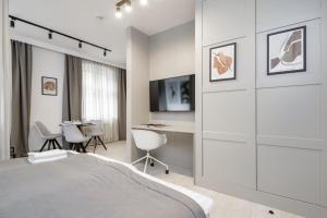 Postel nebo postele na pokoji v ubytování Apartamenty L11, Limanowskiego