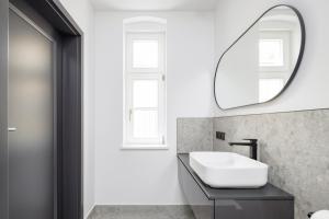 Koupelna v ubytování Apartamenty L11, Limanowskiego