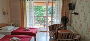 Postel nebo postele na pokoji v ubytování Green Gile Villa in Druskininkai Center