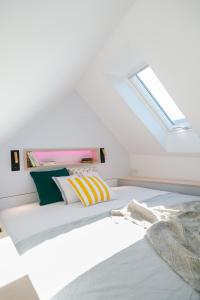 En eller flere senge i et værelse på L'ÉVASION - COZY - RBNB