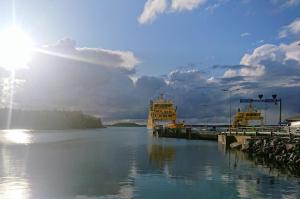 a large body of water with the sun in the sky at Solvillan in Korppoo +11 photos