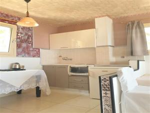 A kitchen or kitchenette at Entire Villa full View 3 bedrooms 3 bathrooms 3 kitchens