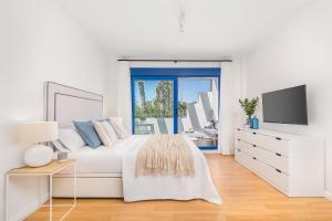 Postel nebo postele na pokoji v ubytování iloftmalaga Playa de Pedregalejo