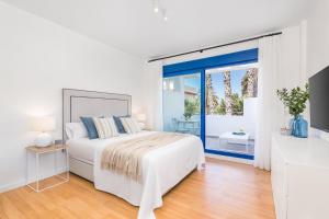 Postel nebo postele na pokoji v ubytování iloftmalaga Playa de Pedregalejo